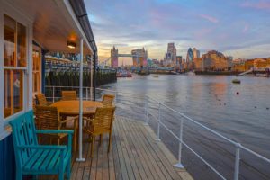 The Harpy Boathouse with stunning views across the river towards Tower Bridge